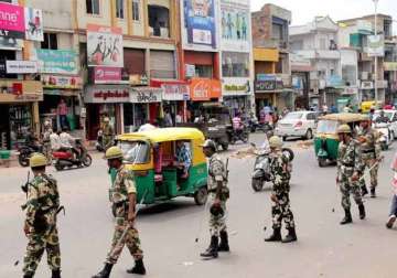 quota row tension eases curfew relaxed in violence hit gujarat