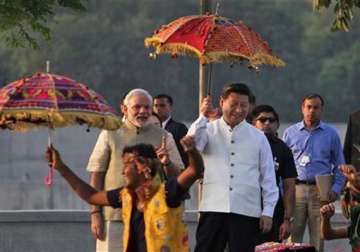 modi gifts copy of gita in chinese to xi at sabarmati ashram