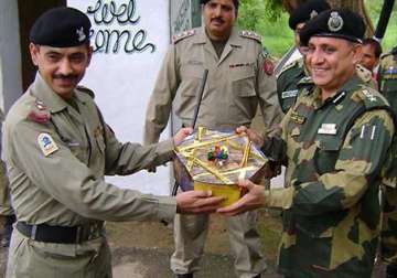 indian pakistani armies exchange sweets on loc