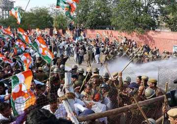 police resort to force to stop congress protest against land bill
