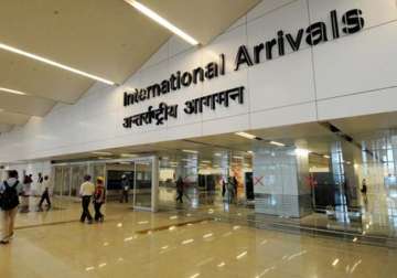 human trafficking racket busted at igi airport two air india staff arrested