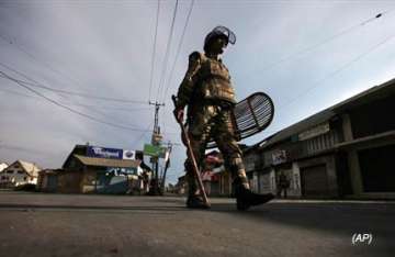 curfew imposed in four districts of kashmir