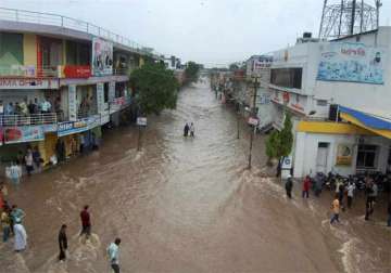 heavy rains lash gujarat 34 dead