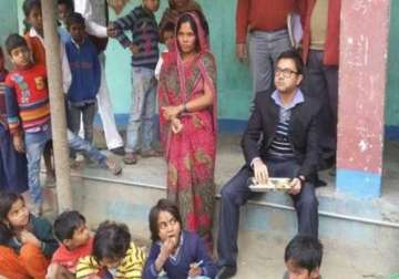 barred by villagers to cook mid day meals widow resumes job