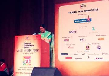 come connect and contribute sushma swaraj tells diaspora youth