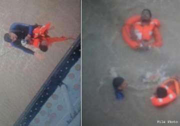 coast guard rescues eight crew members of distressed ship