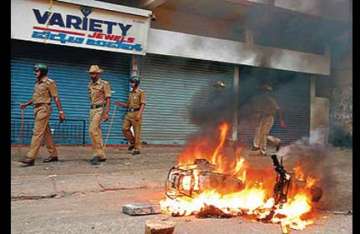 mangalore tense curfew relaxed in shimoga