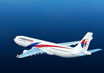 malaysian flight makes unscheduled landing in india