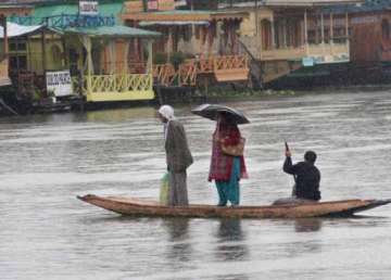 rains briefly hit relief operations another 60 000 evacuated