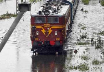 mumbai back to work as rain stops train services restored