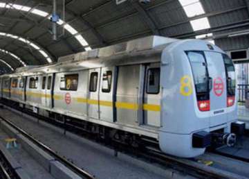 delhi metro runs train fully covered with advertisements