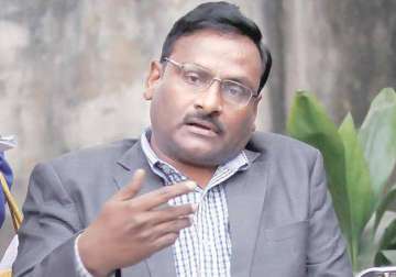 delhi university professor g n saibaba with naxal links surrenders