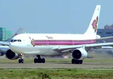 indian held for molesting japanese woman on thai airways flight