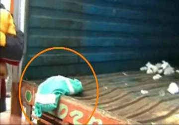 infant s dead body found in delhi hospital waste truck suspension of 2 staffers