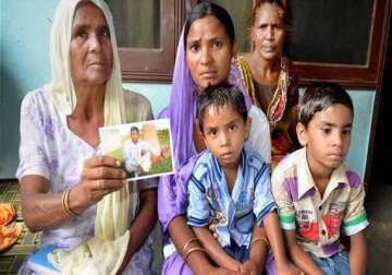 iraq violence with prayer on their lips families of abducted indians wait