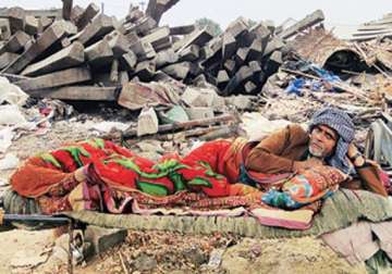 jnu students distribute blankets to families rendered homeless after demolition