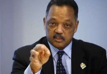 jesse jackson urges iim students to free india of poverty