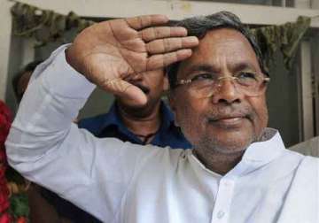 karnataka chief minister promises to solve farmers problems