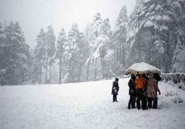 kashmir valley lashed by rains higher reaches receive snow