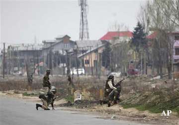 kashmir police detains phd staff for sheltering two shootout militants