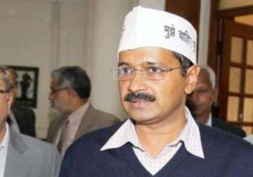 kejriwal threatens to sit on dharna if police officials not suspended
