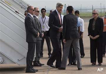 kerry lands in india climate change business on top