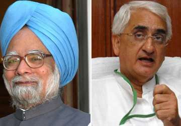 khurshid speaks to pm after ec complains to president