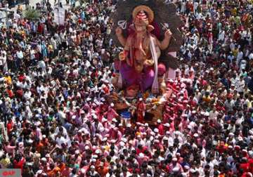 lakhs come out on roads as maharasthra bids adieu to lord ganesh