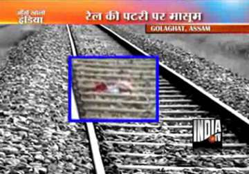 left to die on assam rail track infant survives after two trains pass over
