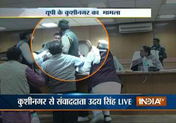 live footage up district panchayat member slaps throws food at senior officer