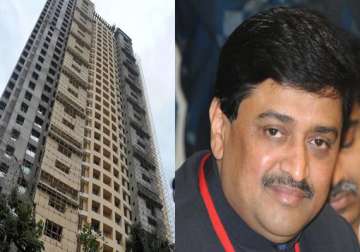 maharashtra govt partially accepts adarsh report gives clean chit to politicos