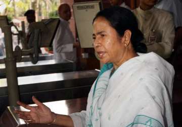 mamata accuses gjm of stalling development in the hills