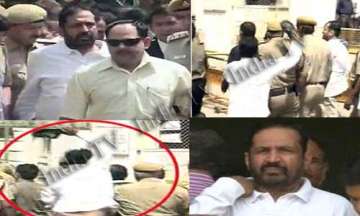 man hurls slipper at kalmadi inside delhi court complex