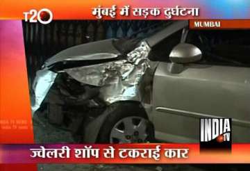 man runs over honda city car over mumbai pavement rams into jewellery shop