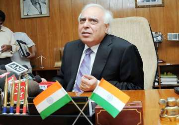 man sends rs 1 lakh cheque as bribe to kapil sibal