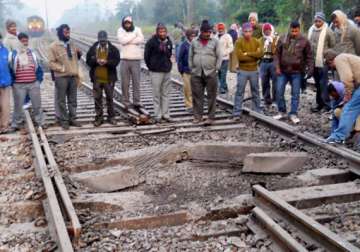 maoist bandh railway tracks blown up mobile tower set afire