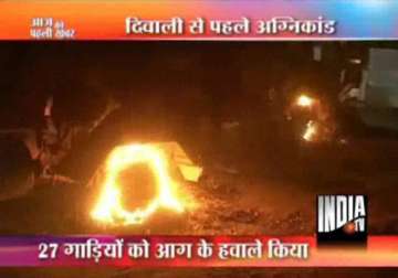 maoists set fire to 27 trucks in orissa