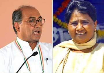 mayawati feeling threatened by congress says digvijay