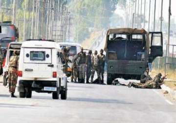 militant fires at mini bus 4 wounded