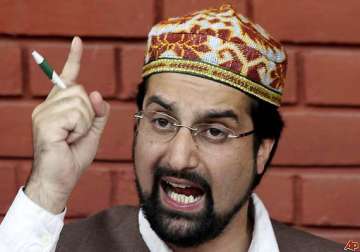 mirwaiz condemns attack on prashant bhushan