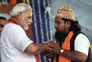 modi begins his day long sadhbhavana fast in godhra