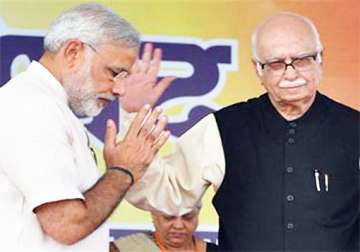 modi breaks silence on tiff with advani praises yatra