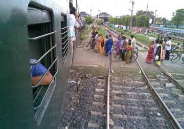 mother and son run over and killed by train at level crossing