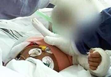 mother reunited with battered baby falak