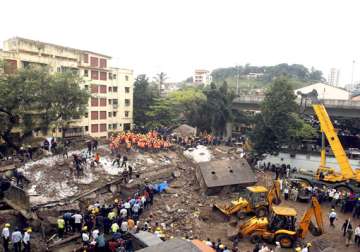 mumbai building collapse bmc suspends 7 engineers