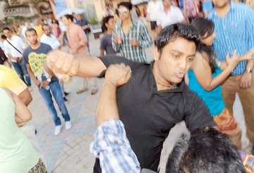 mumbai bouncer held for beating up photographers in hotel