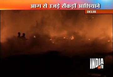 nearly 500 slum huts gutted in delhi fire