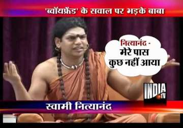 nityananda flares up on seeing tv reporter showing summons