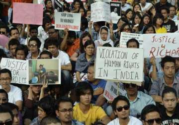 northeast students hold protest over student s death meet kejriwal