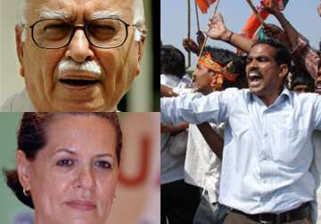 pm sonia should make telangana a reality by new year advani